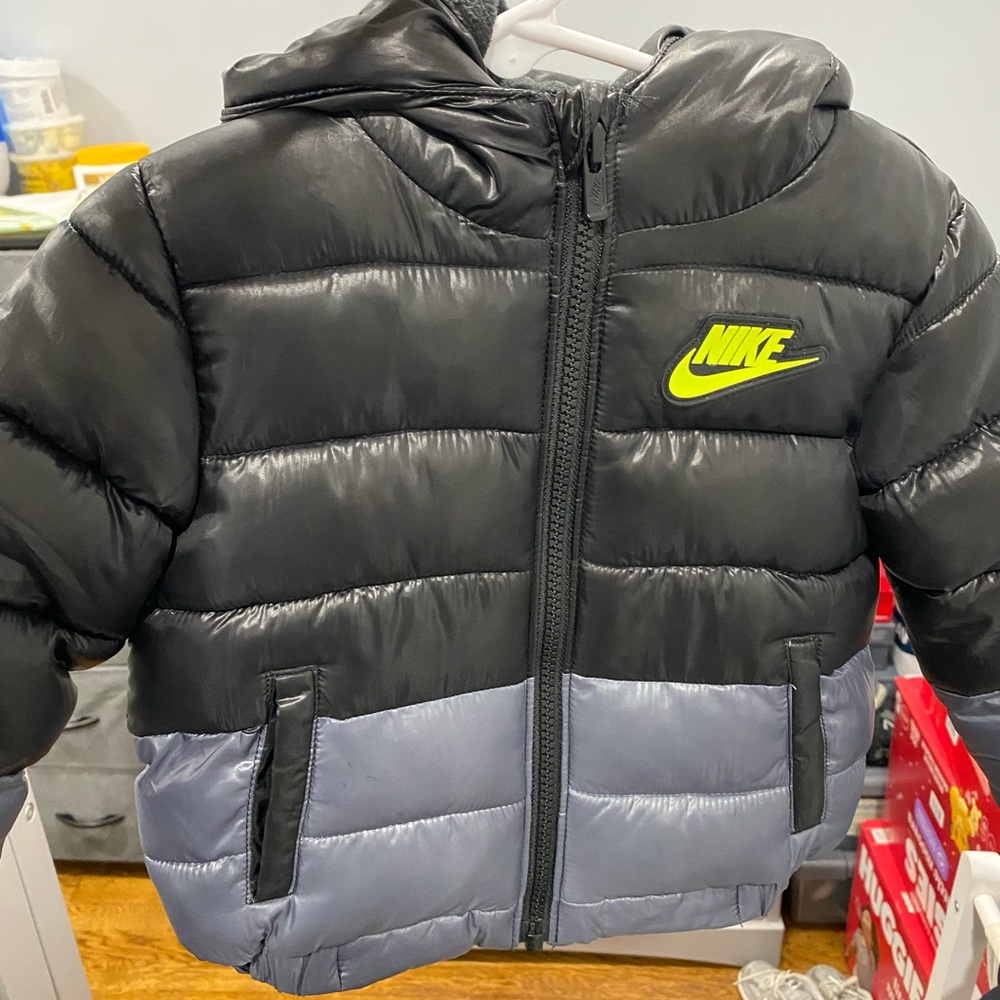 Nike Black and Silver Puffer Jacket with Neon Logo